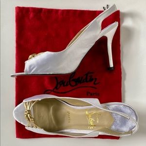 Louboutin Lilac Satin peep-toes Shoes. Like new.